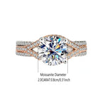 Rose gold ring with a large gemstone on a white background