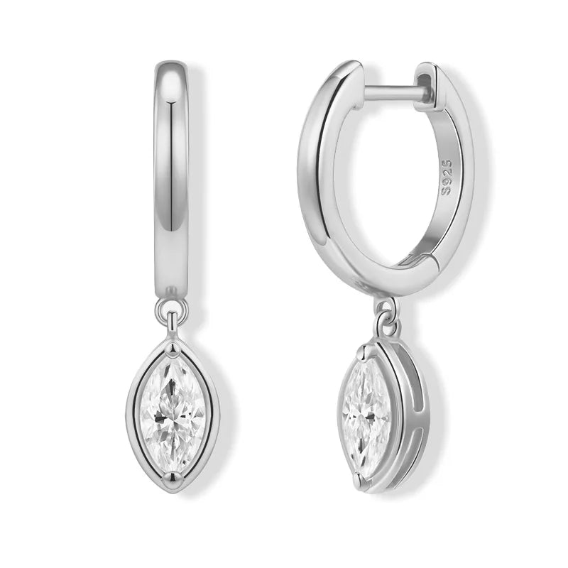 Silver hoop earrings with marquise-shaped gemstones on a white background