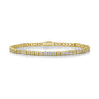 Gold tennis bracelet with pavé-set moissanite stones in a continuous line displayed on a white background