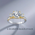 Gold and silver ring with diamond measurements on a gray background