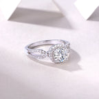 Silver ring with a large diamond on a white background