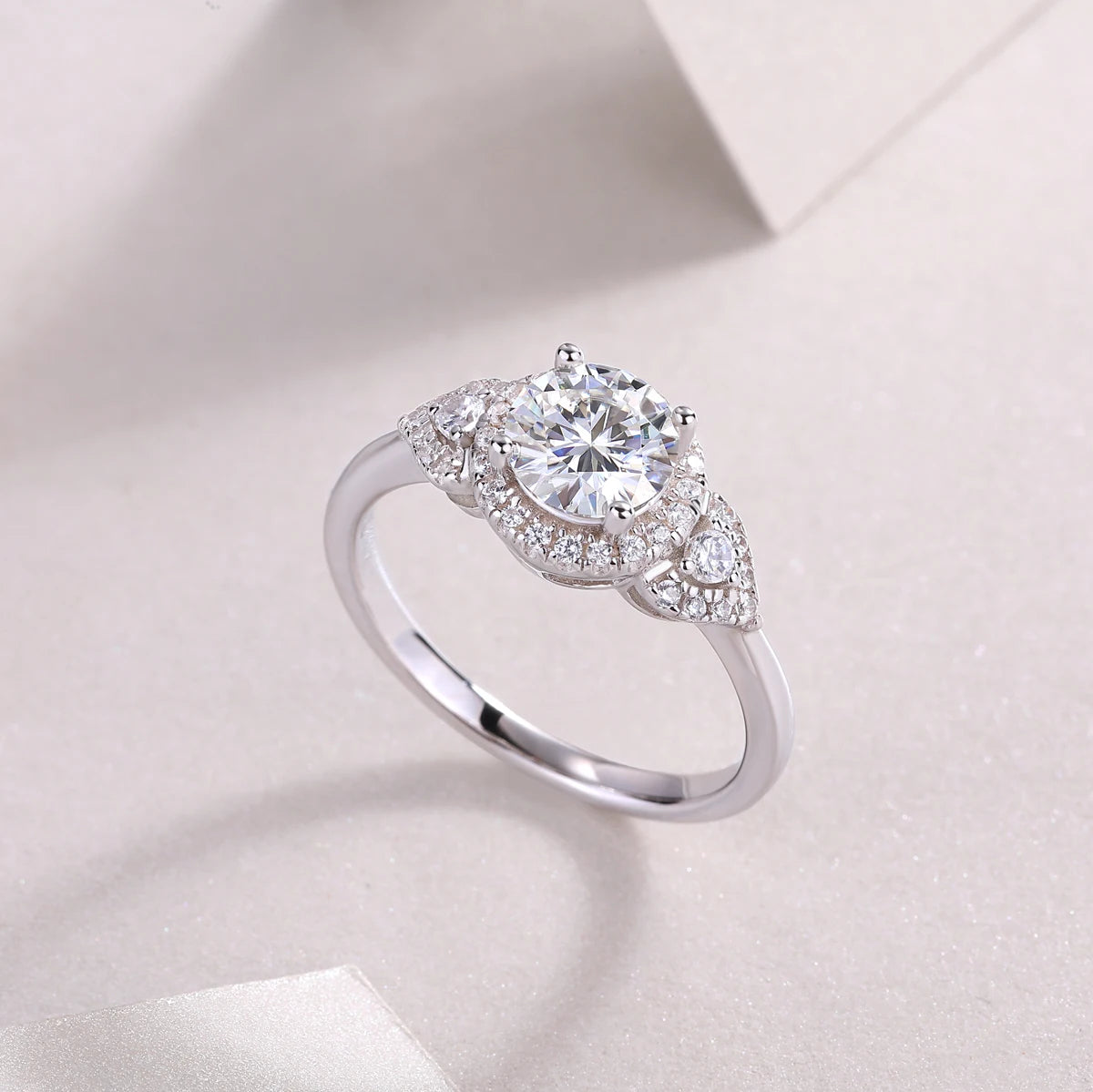 Esther - 3 Round Stone Halo Engagement Ring