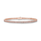 Rose gold tennis bracelet with pavé-set moissanite stones in a continuous line displayed on a white background
