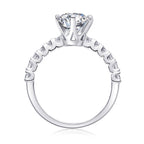 Silver ring with a diamond on a white background