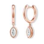Rose gold hoop earrings with clear gemstones on a white background