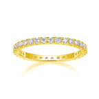 Gold ring with diamonds on a white background