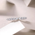 Diamond ring on a soft fabric background