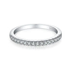 Silver ring with small diamonds on a white background