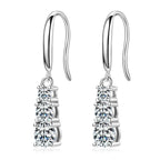 Three-stone dangle earrings with moissanite – 925 sterling silver