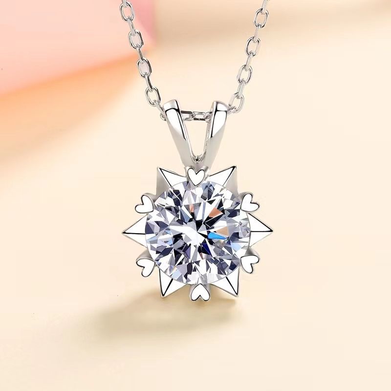 Silver necklace with a diamond pendant on a gradient background