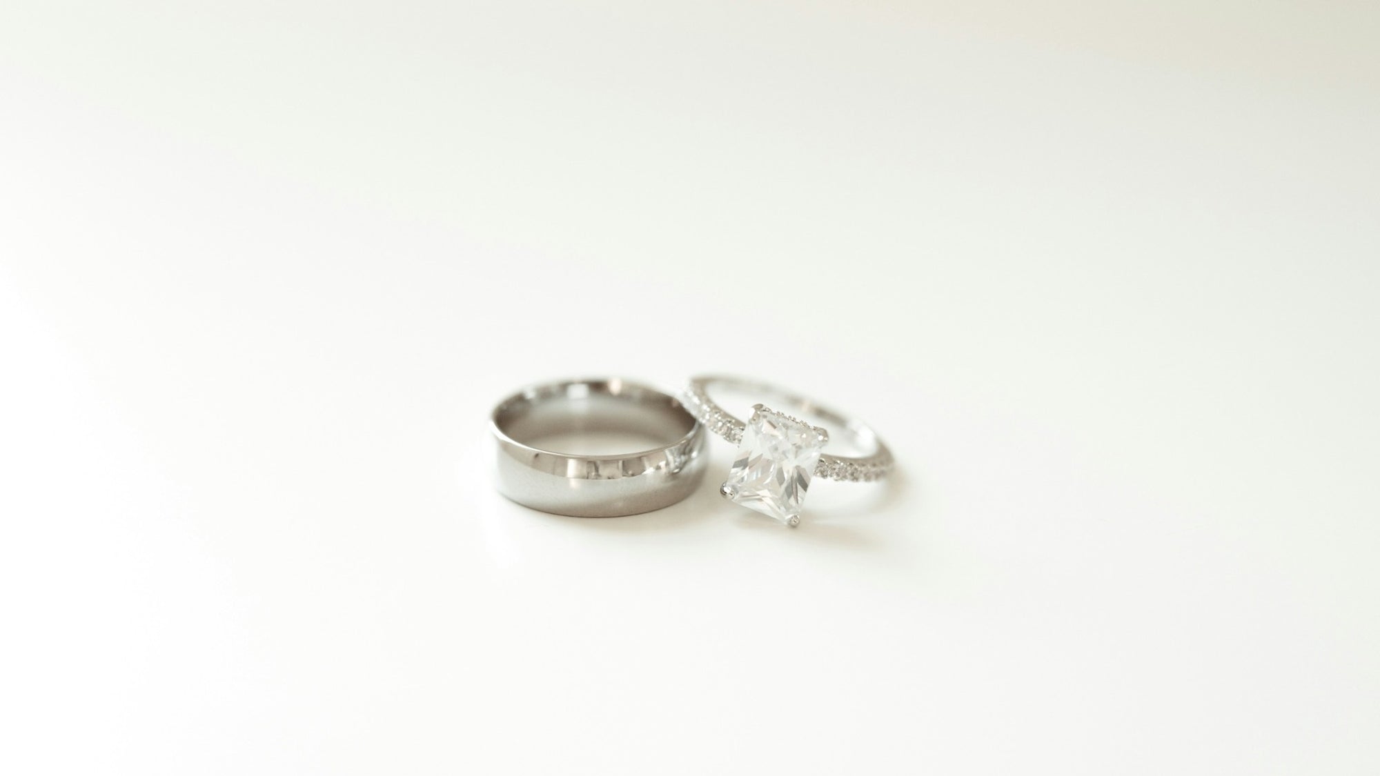 Two silver rings on a white background