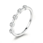 Five-stone floating band with moissanite – 925 sterling silver